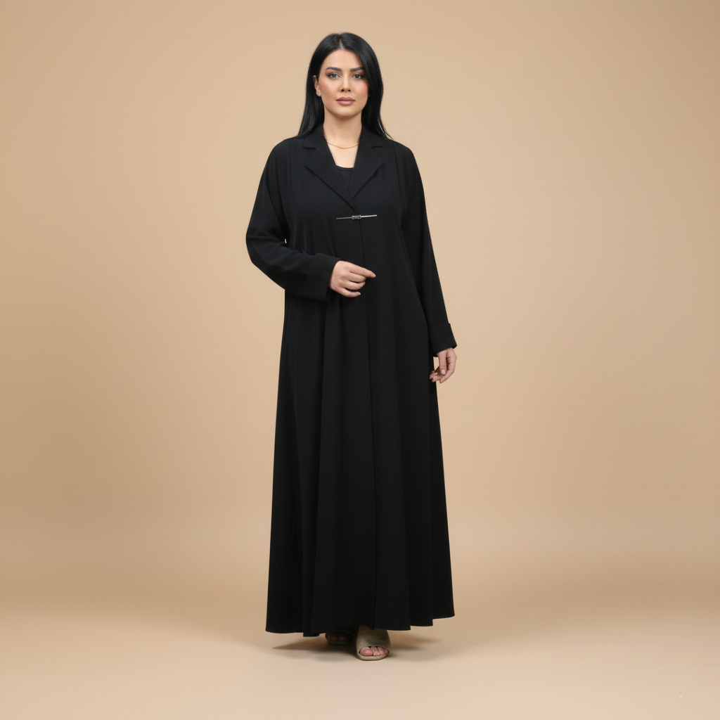 black abaya with jacket collar, and brooch.