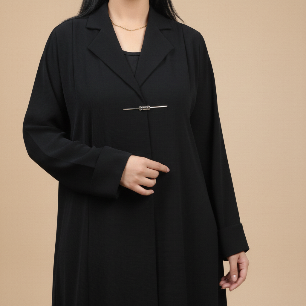 black abaya with jacket collar, and brooch.