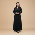 A black printed crepe abaya .