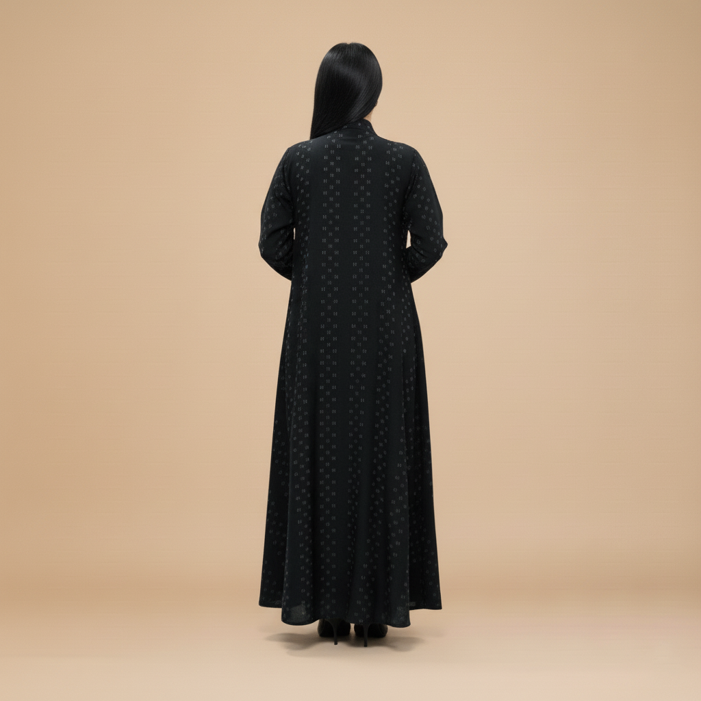 A black printed crepe abaya .